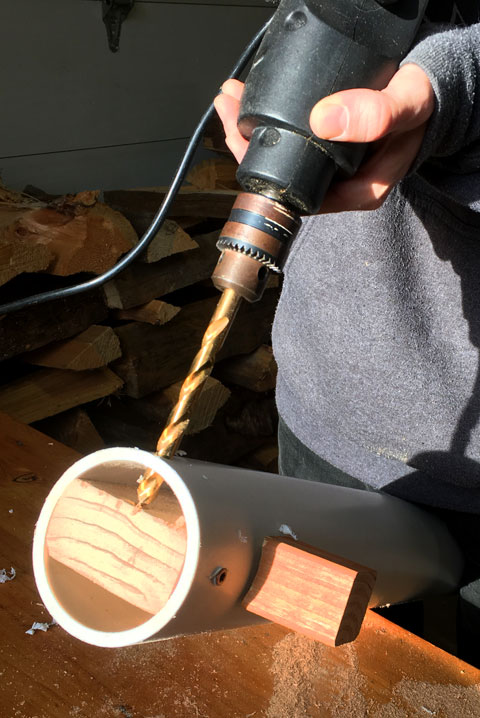 Drilling a hole in a PVC pipe for a cat tree