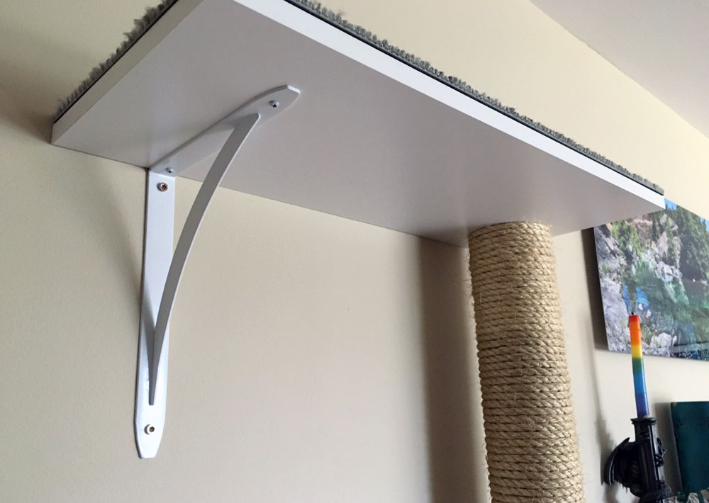 Shelf bracket for cat tower shelf